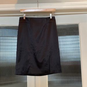 Mid length black skirt